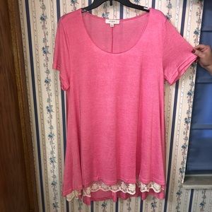 Umgee pink top with lace around the bottom